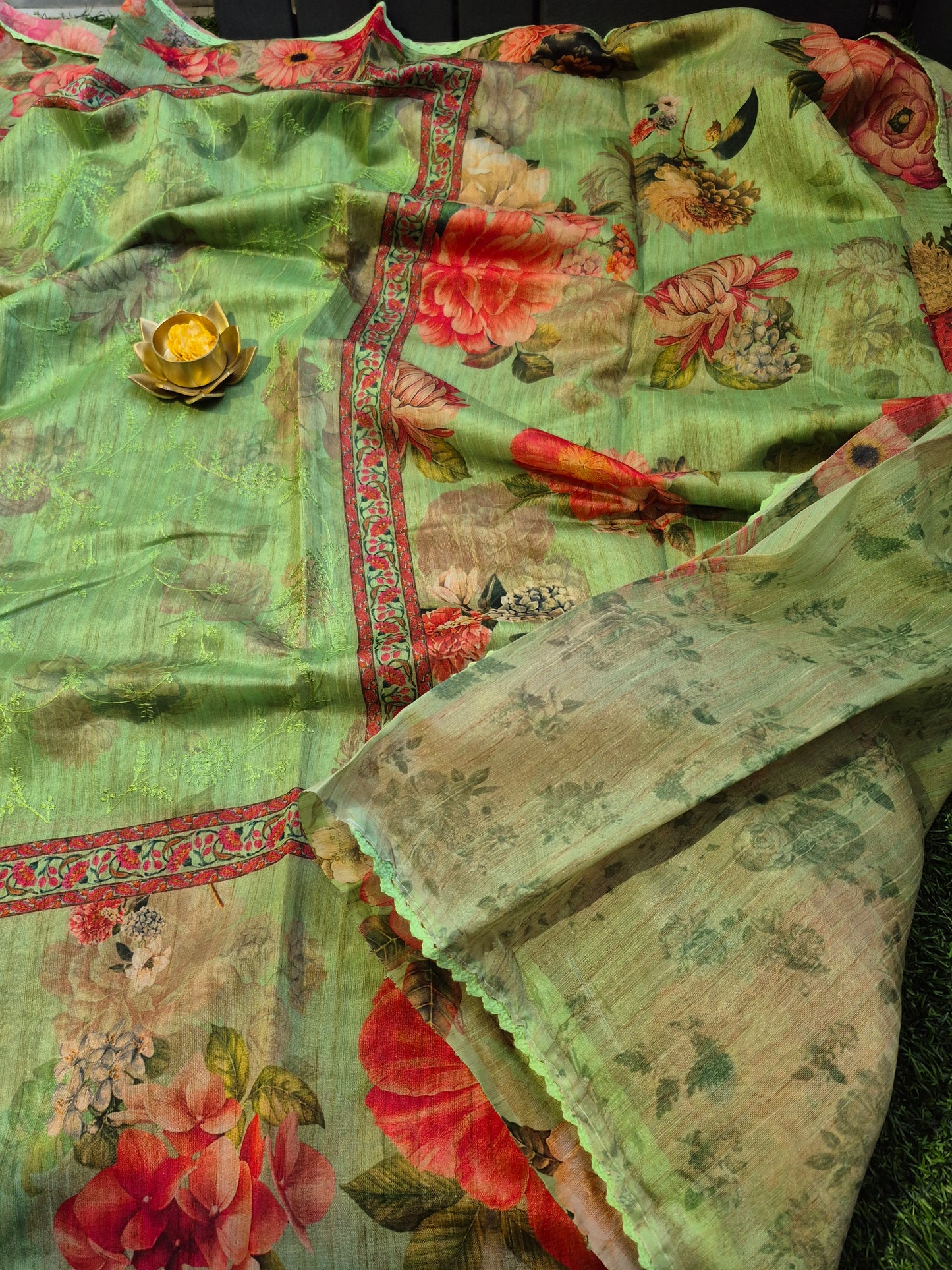 Pure Maheswari Silk with floral design along with nice embroidery